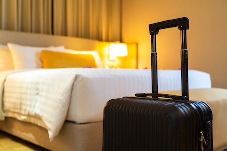 Luggage in a hotel room.
